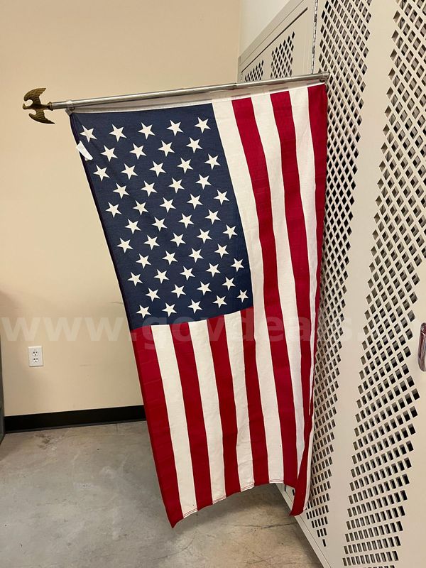 American flag with partial metal pole