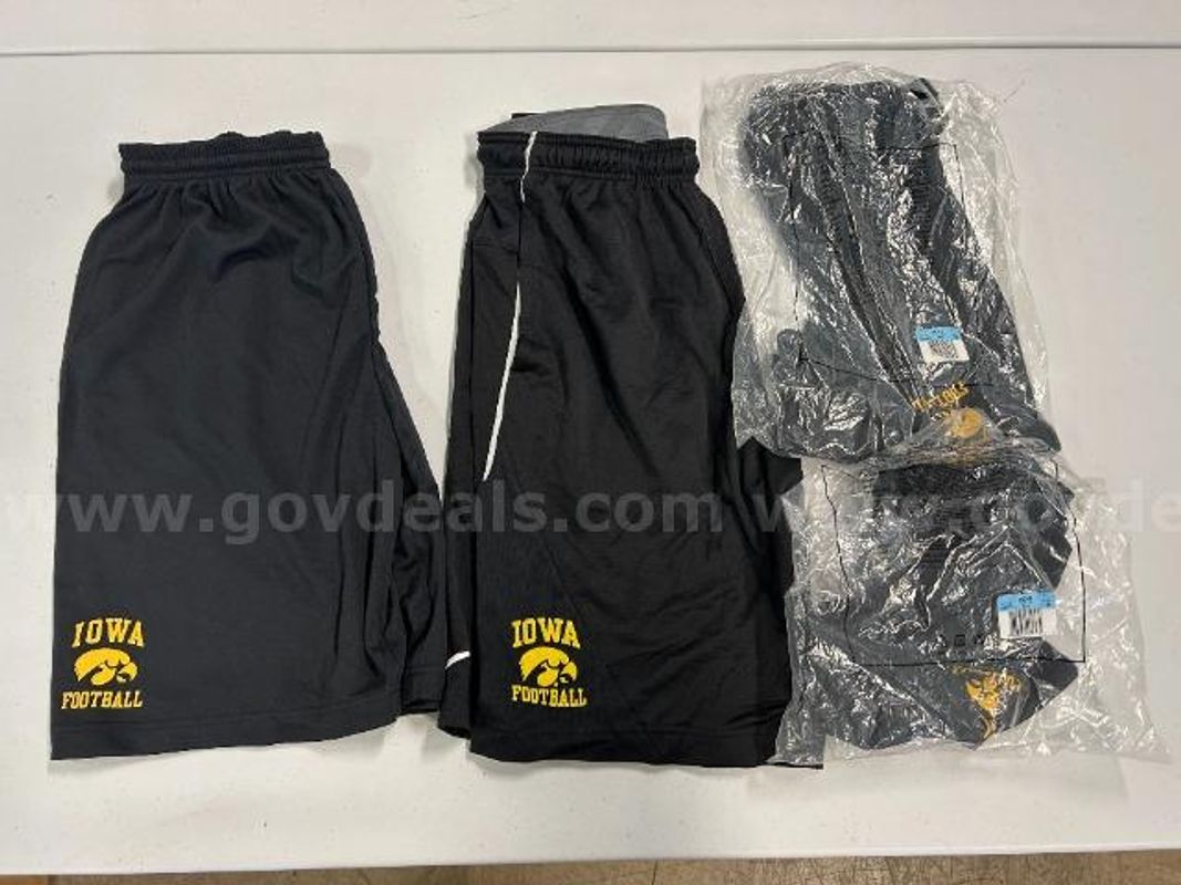 Lot of 4, Nike "U of I" Football Dry-Fit Shorts, Black in color. Size: M