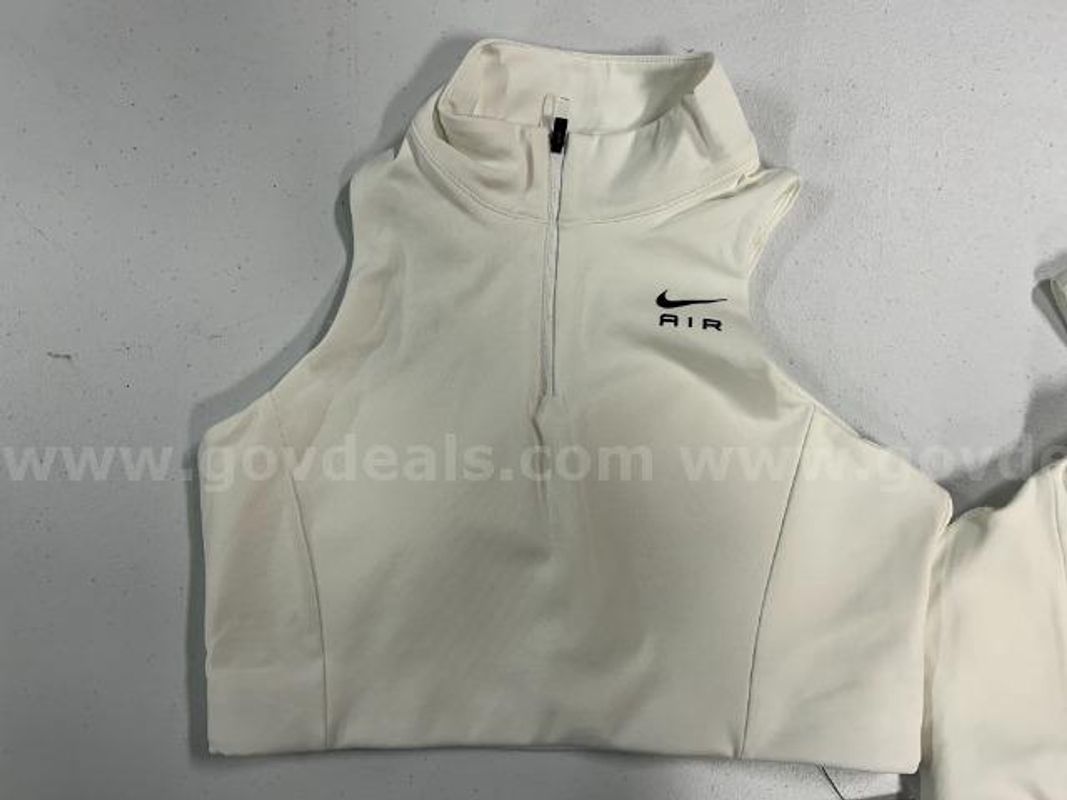 Lot of 2, Nike Air Dri-Fit Swoosh Mock Zip Sports Bra.White in color.Size:M