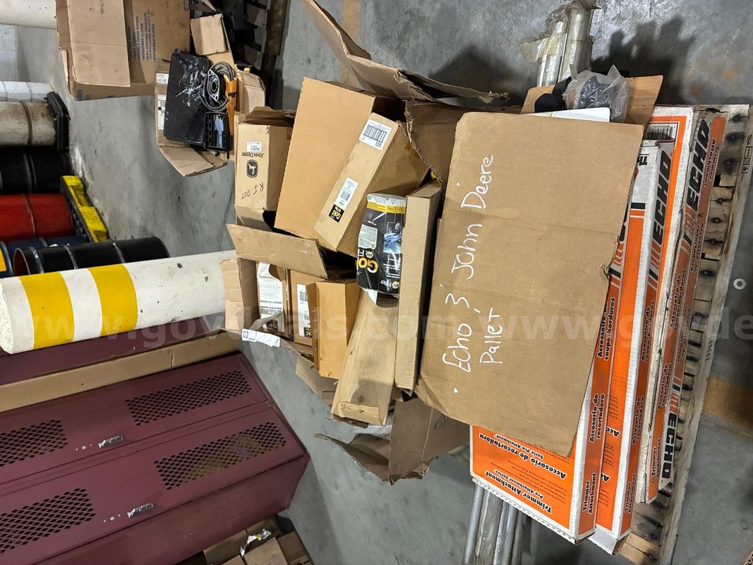 pallet of parts John Deere and Echo