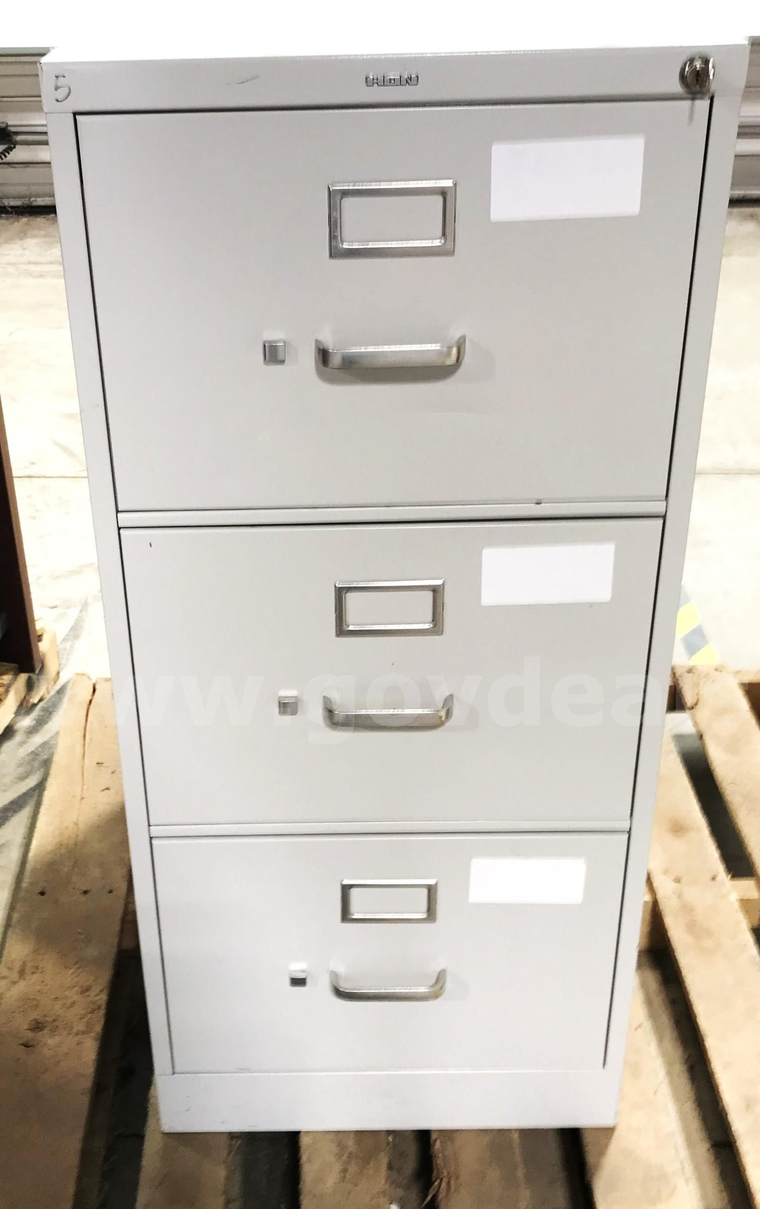 Used 3 drawer vertical file cabinet with key. (S2)