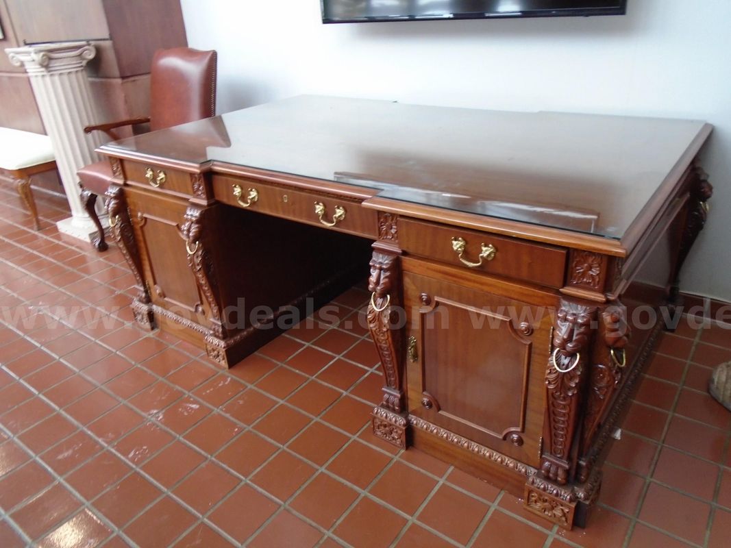 Carved double pedestal executive partners desk (mahogany)