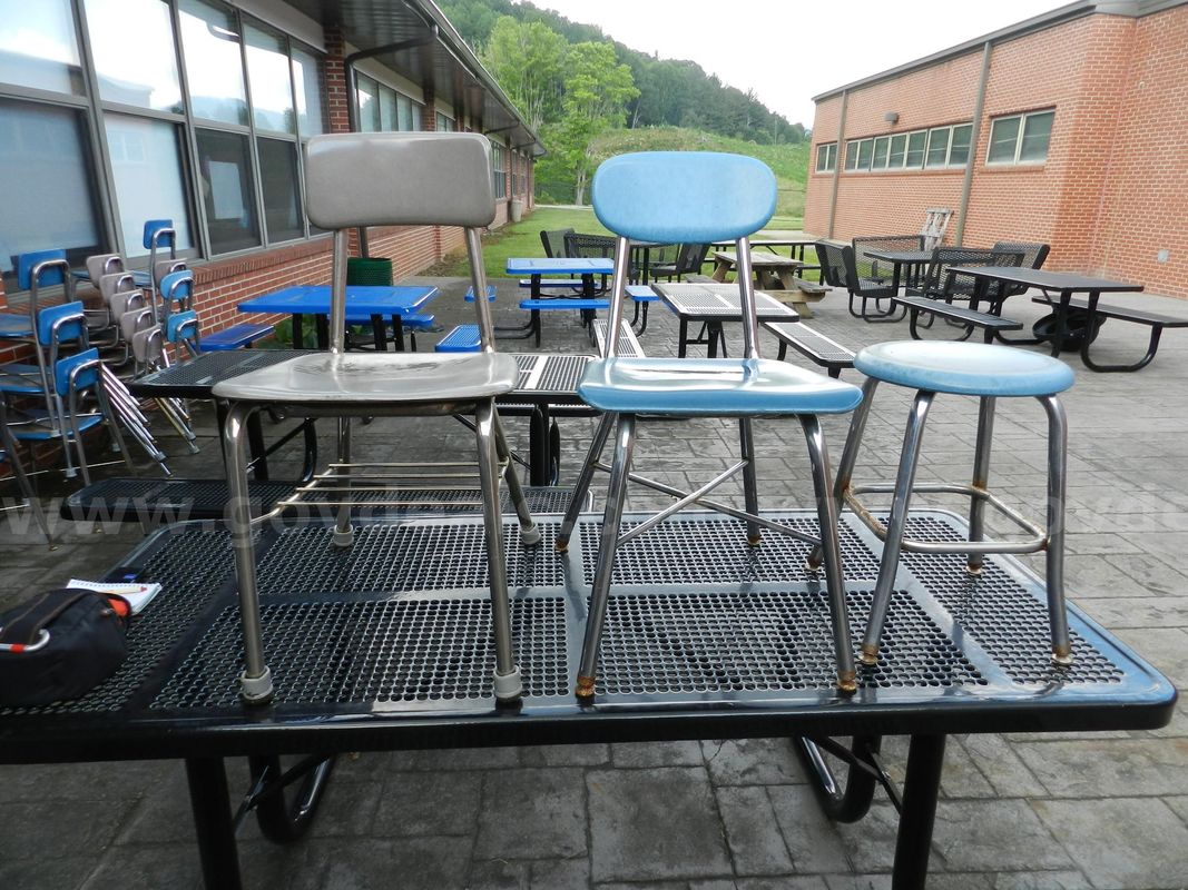 One lot of 35 Middle School chairs for sale