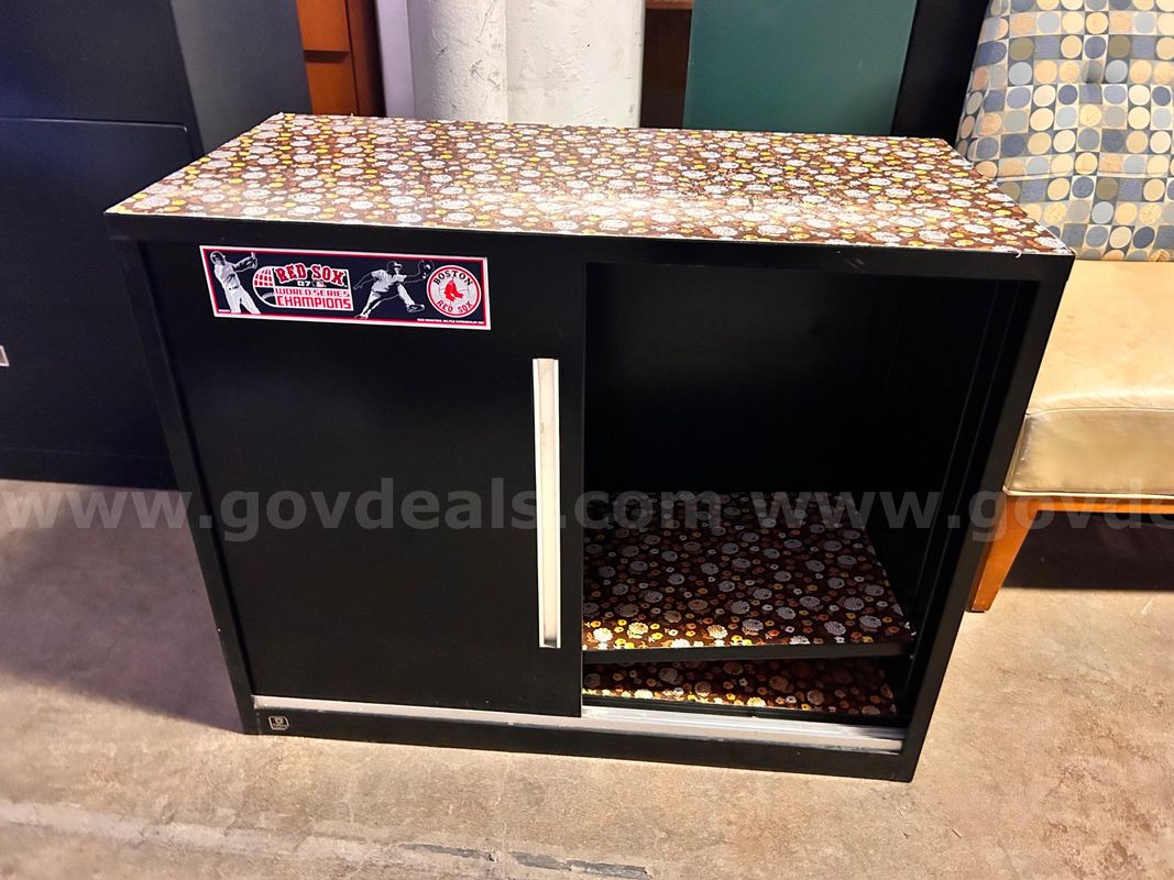 Low steel sliding door storage cabinet