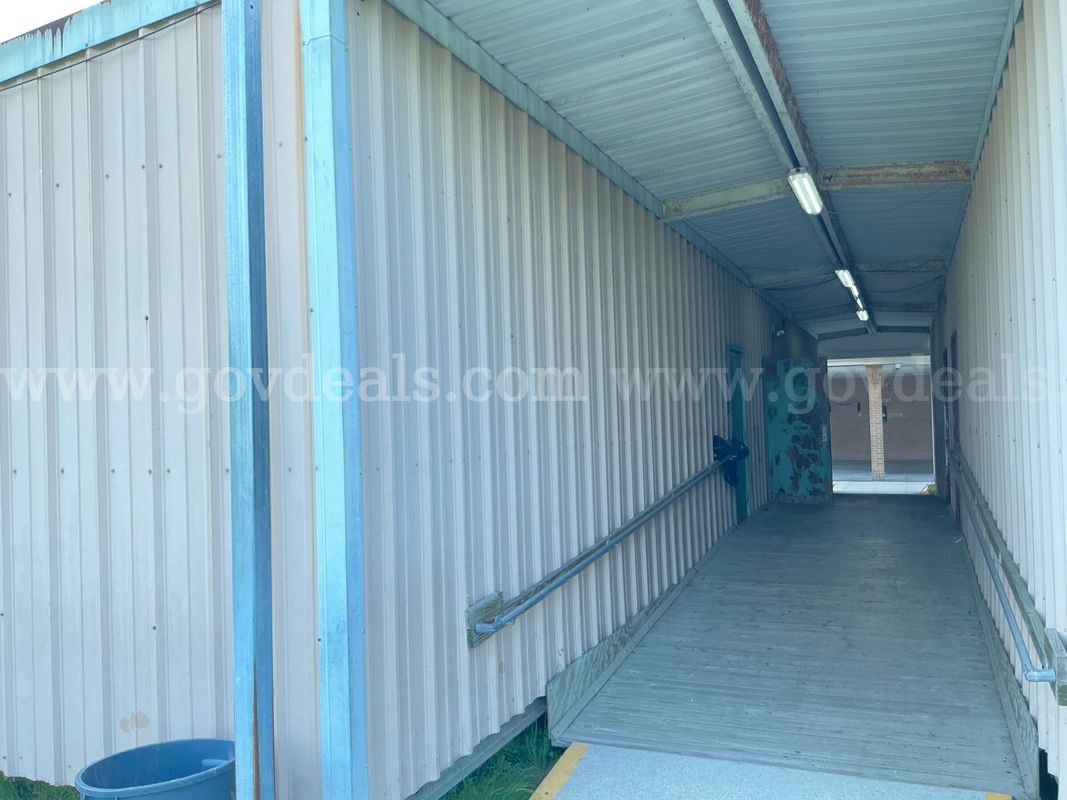 PORTABLE BUILDING -Approximately dimensions of 24’ x 64’