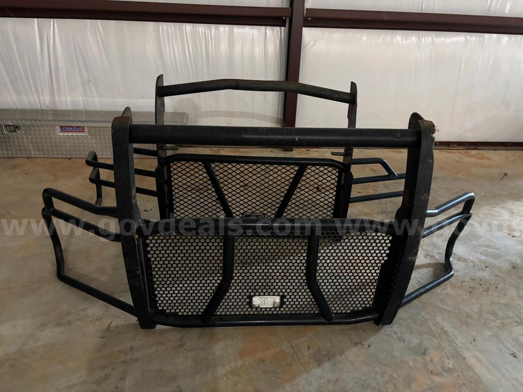 Heavy-duty STK steel grille guard / brush guard from a Chevrolet pickup truck.