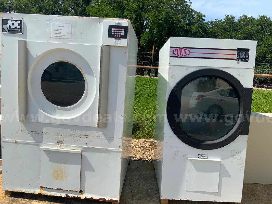 1 American Dryer And 1 Milnor Dryer.