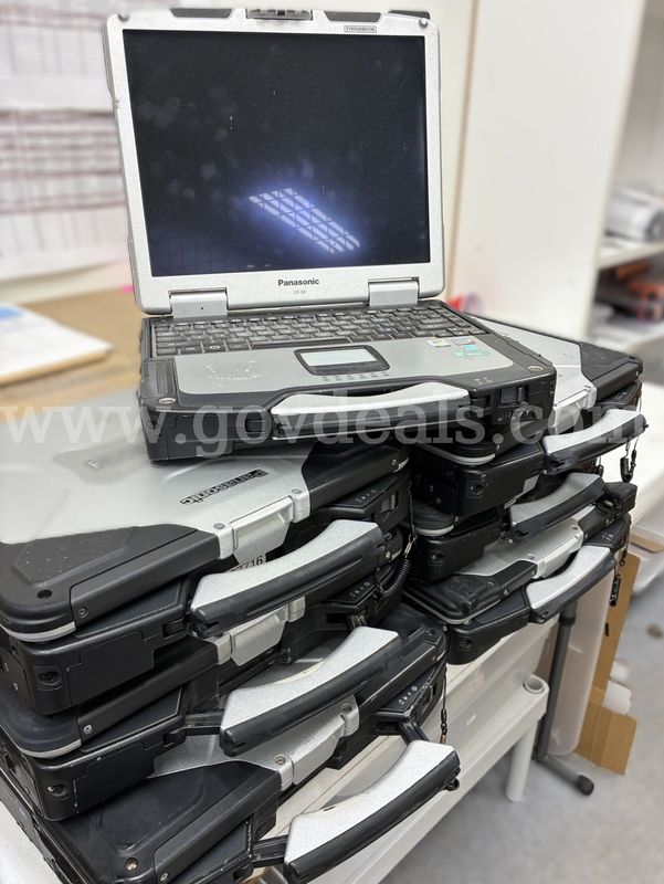 Seven Panasonic CF-31 Toughbook computers
