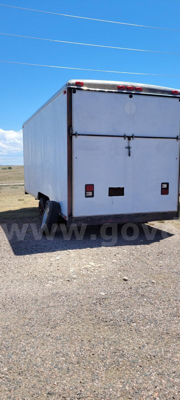 20 ft White Enclosed Wells Cargo trailer, contents included