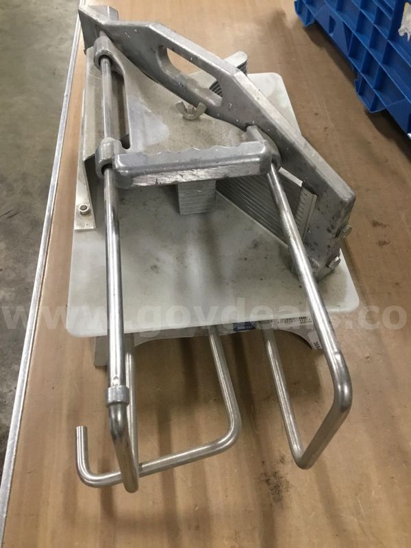 19 x 9 1/2 silver food slicer "DH"