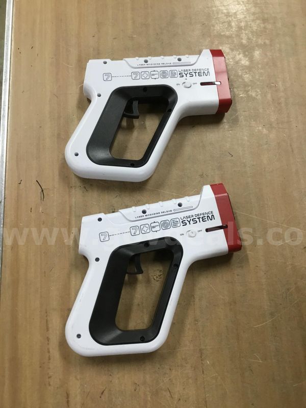 Two 7 inch white Laser Defense System laser toy guns (BATTERIES INCLUDED) "DH"