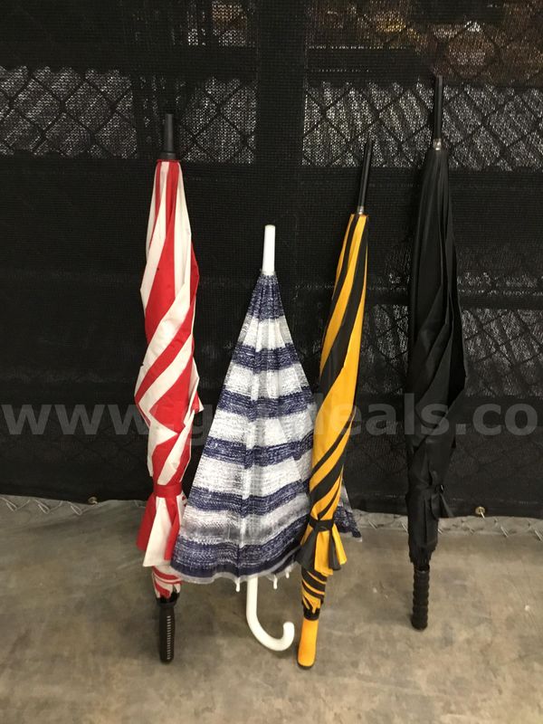 red & white striped umbrella, yellow & black striped umbrella, navy blue & white striped umbrella, black umbrella "DH"