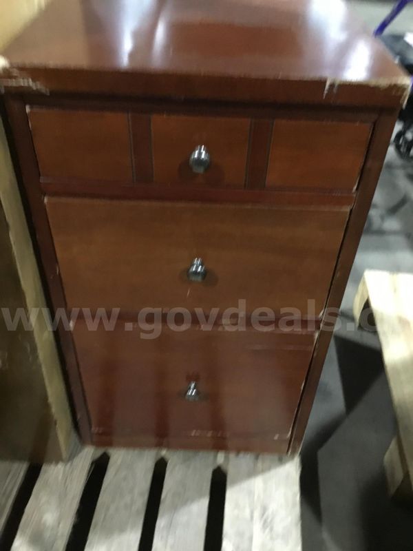 21 x 15 1/2 x 27 1/2 dark brown hardwood three level drawer “DH”