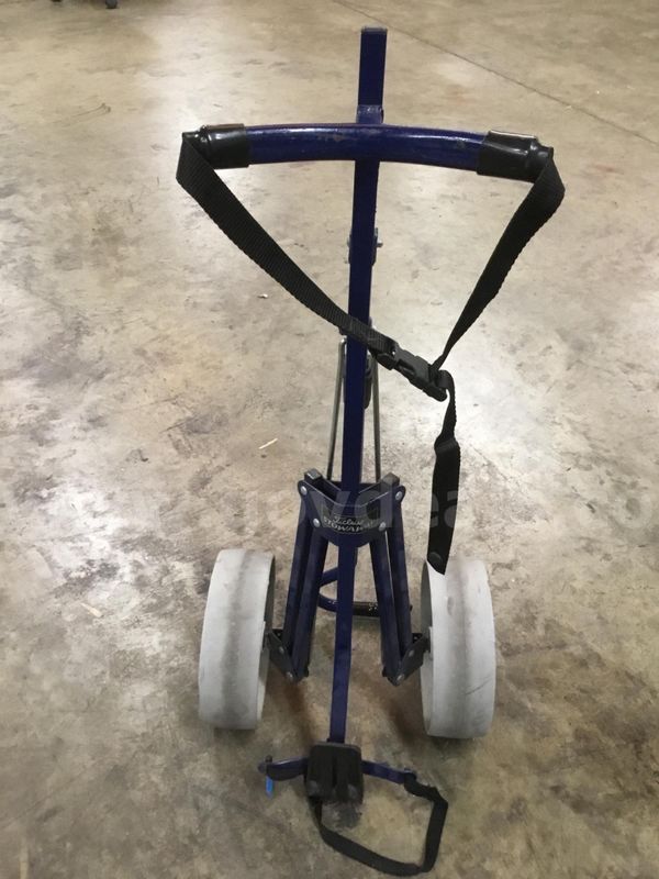 Dark blue Titleist stowaway wheel golf cart “DH”
