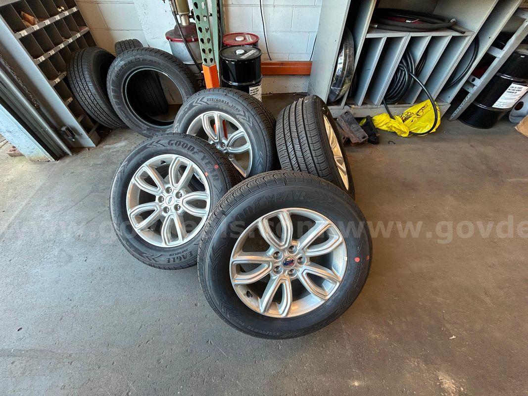 Set of Goodyear tires and Ford Rims