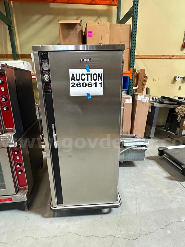 FWE universal heated holding cabinet features 12 adjustable universal no-tip wire rack positions for sheets and pans, an