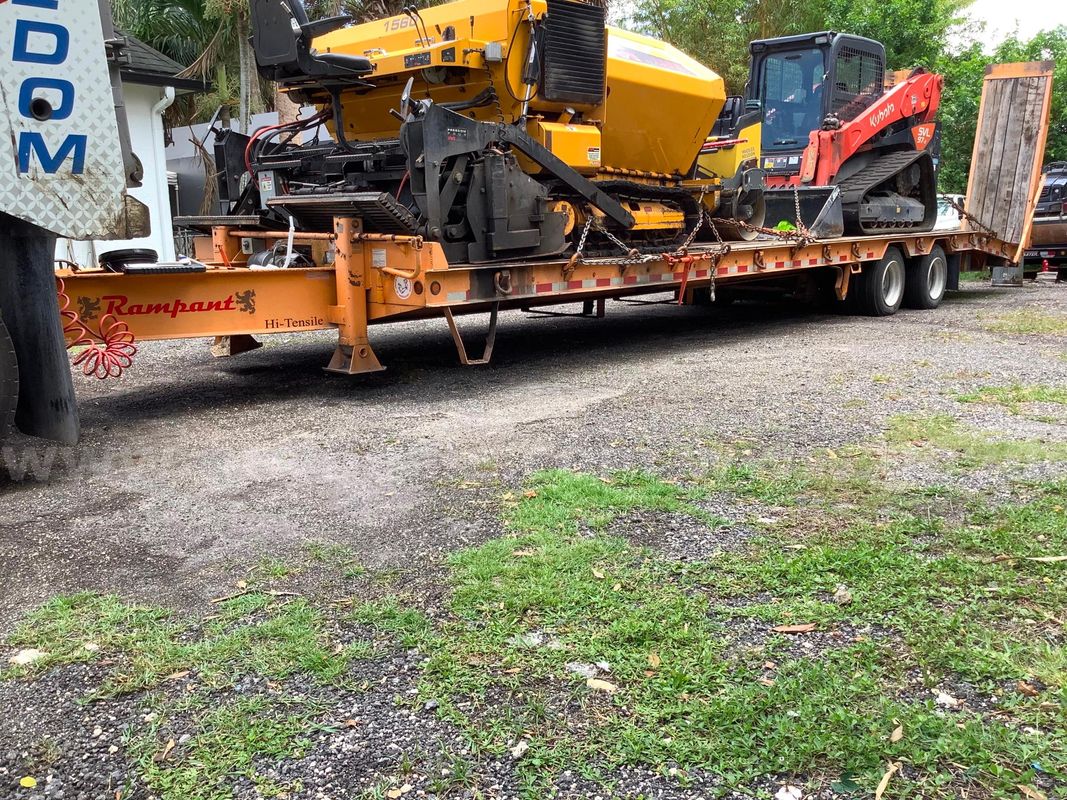 2020 Rampant 20-Ton Equipment Trailer, Asphalt Package, Air Brakes, Hyd. Ramps