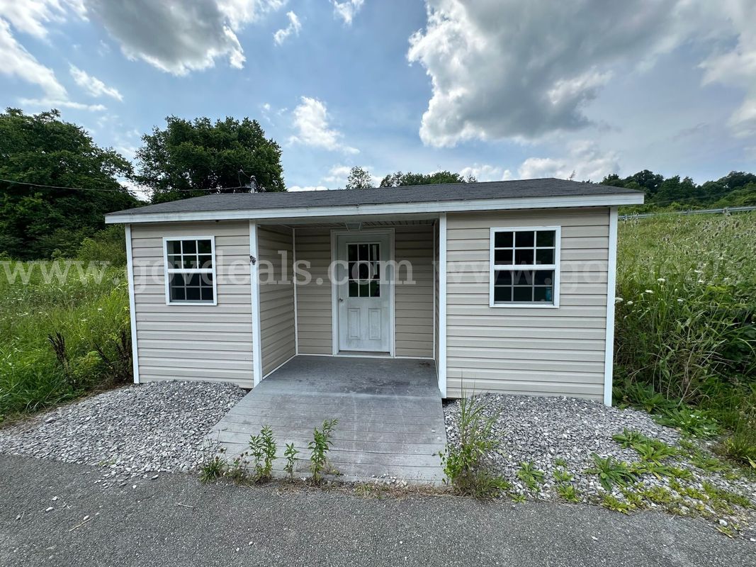 Outdoor Storage Building/She Shed/Office/Playhouse Measuring Approx. 20 FT x 14 FT