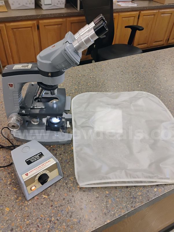 Microscope with light source