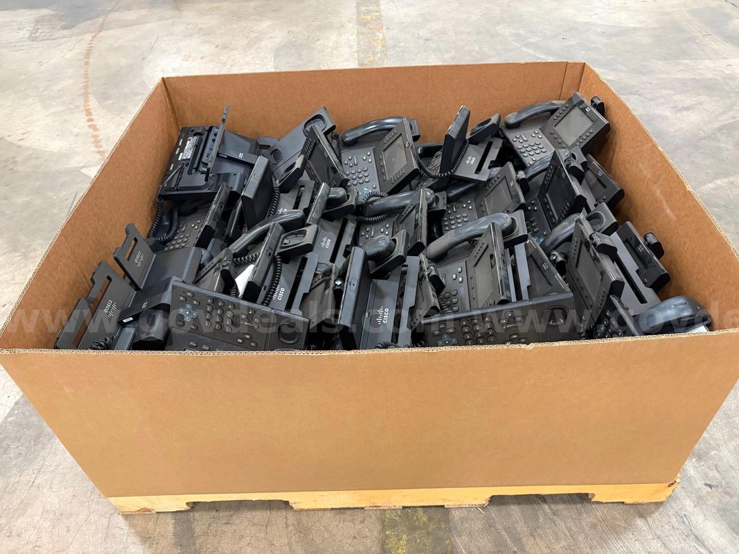 Pallet of various Cisco phones, mostly Cisco 9951 VoIP.