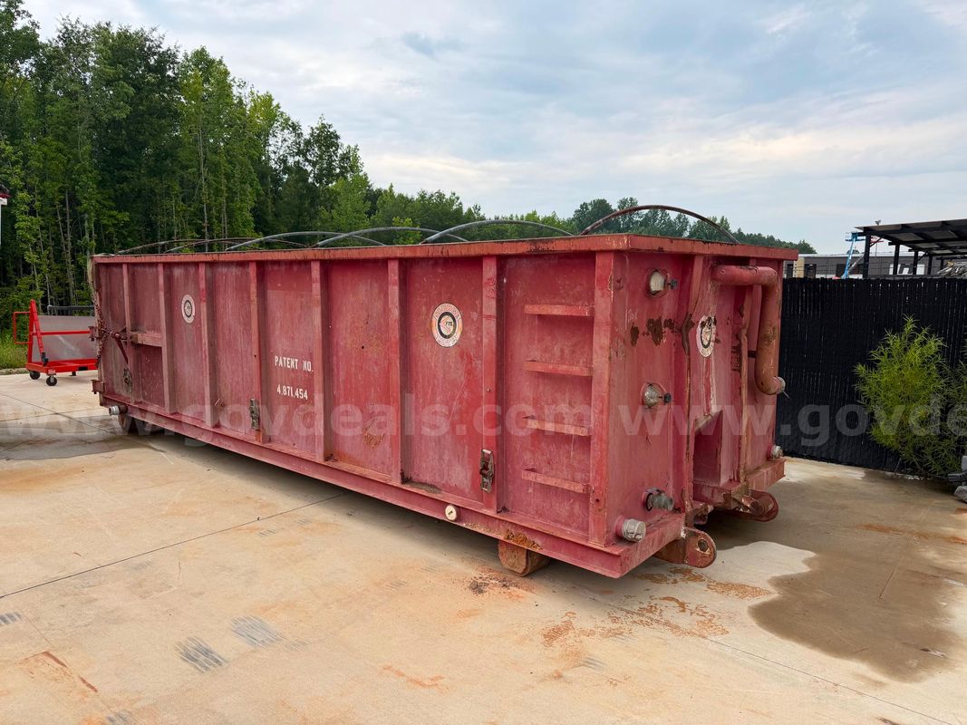 Dewatering roll off container