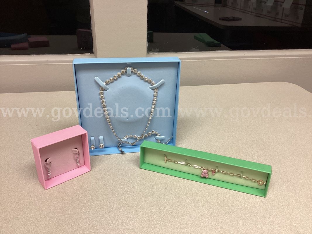 Lot of 3 SWAROVSKI jewelry pieces, Attract Trilogy Drop earrings, a Teddy Bracelet , and a Angelic set