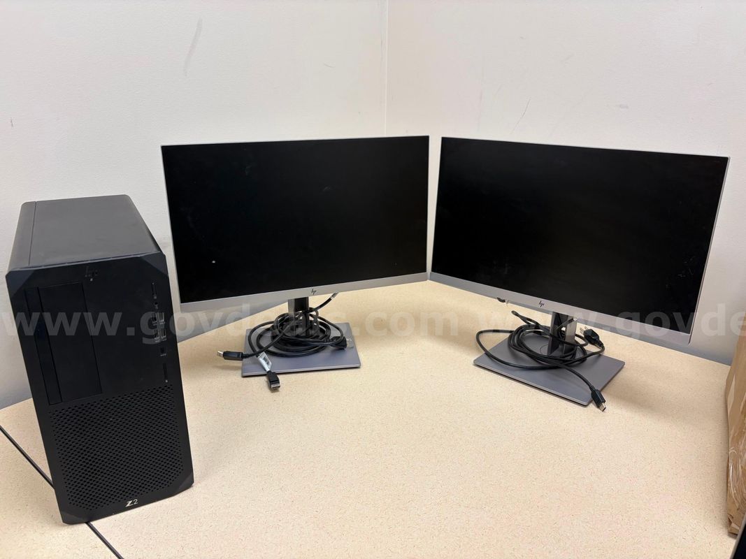 One HP Z2 Tower Workstation and two HP E223 23” monitors