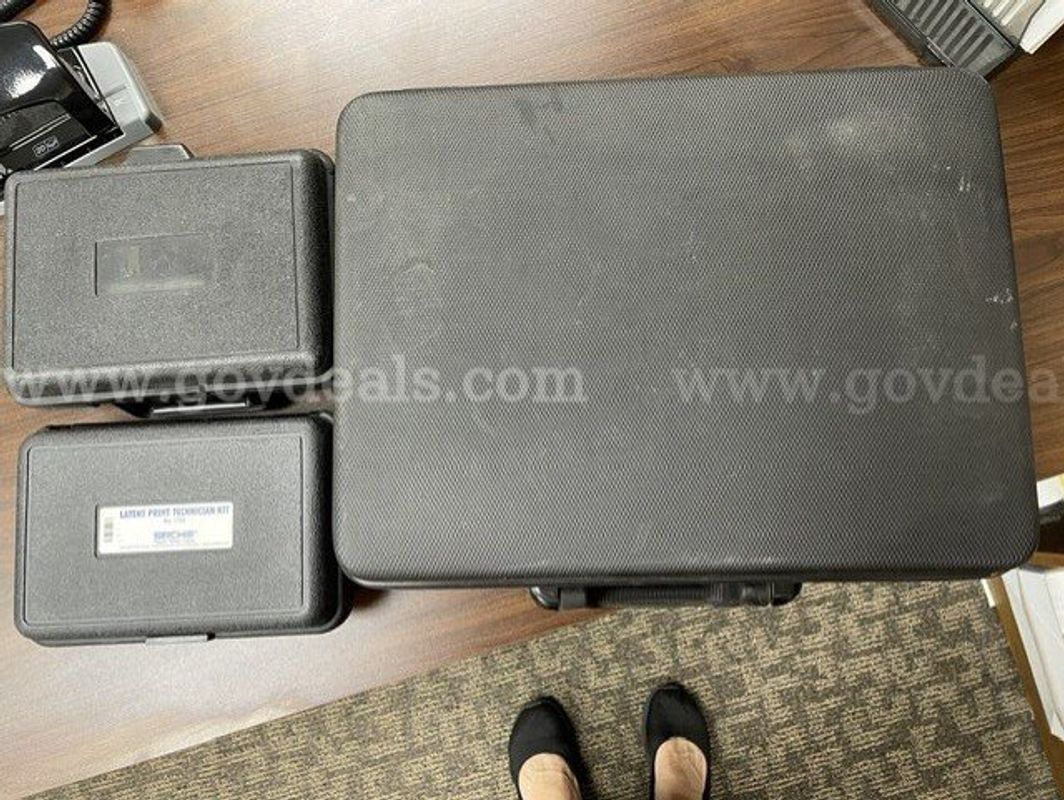 (3) used Sirchie fingerprint / latent print technician kits.