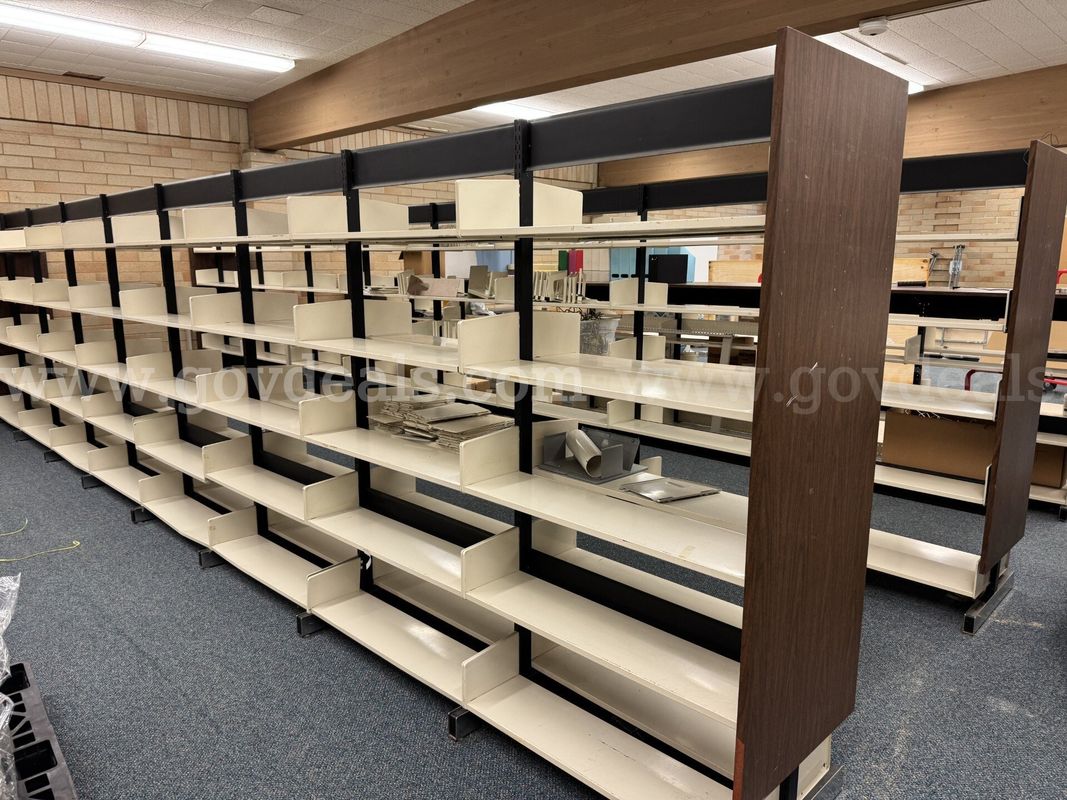 3 library shelving units plus components for another.