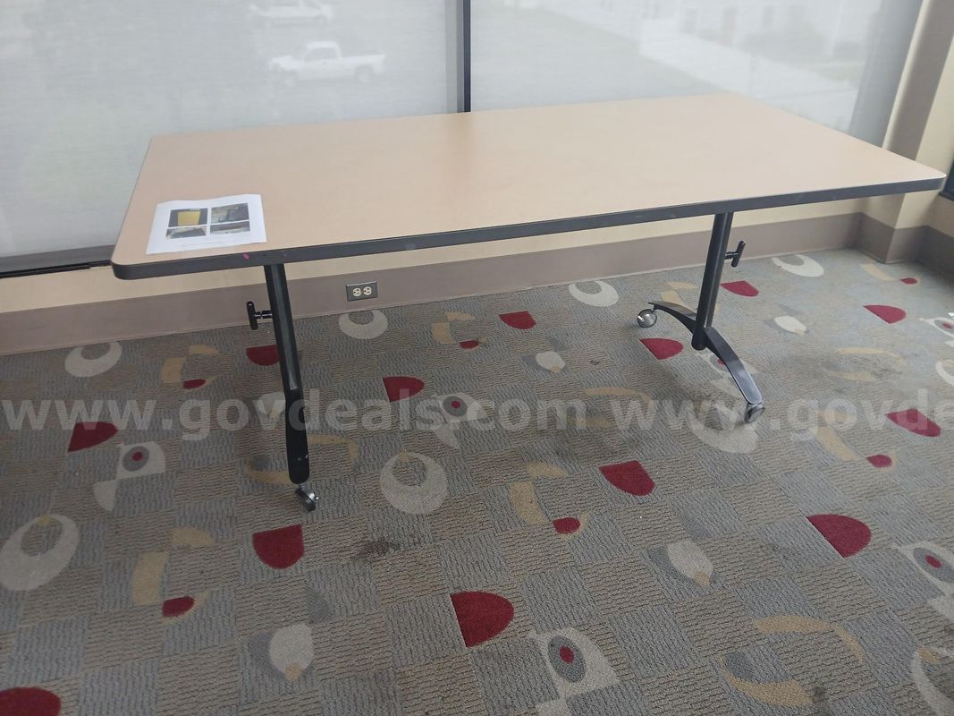(1) Conference room table 3' x 6' adjustable height