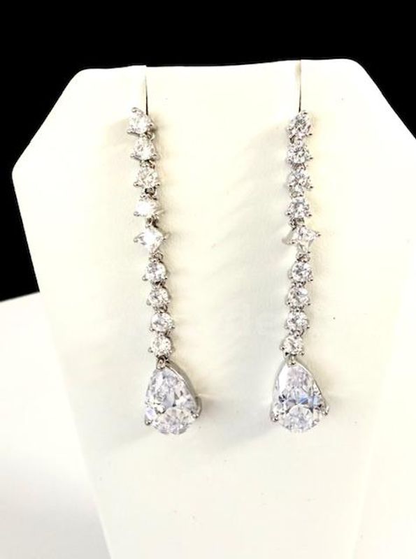 Gorgeous, Rhodium Clad, CZ Solitaire Pear-Shaped Hanging Earrings W/Brilliant Accents