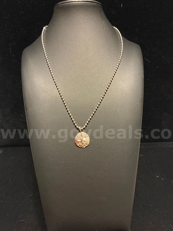 Gorgeous, Rhodium Clad (Silver) Sand Dollar Pendant.