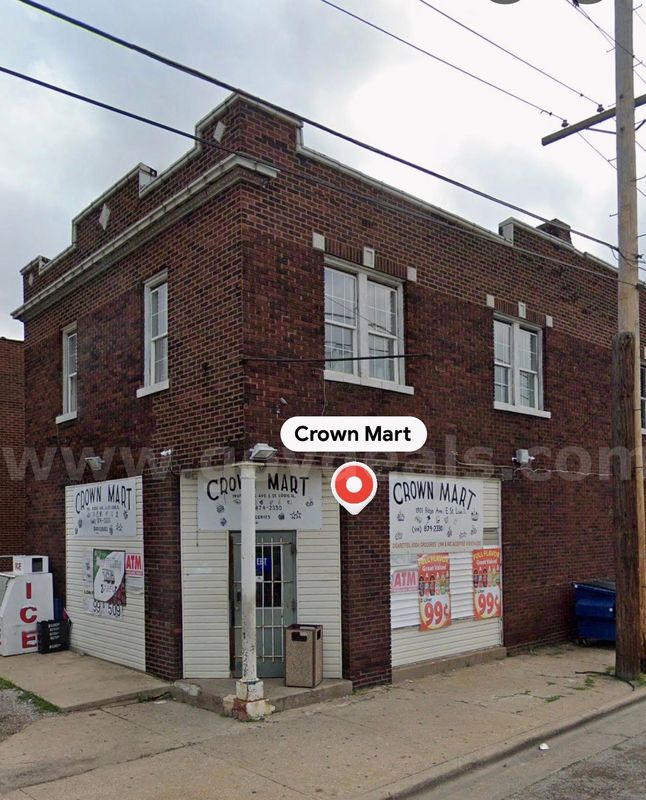 A large building with two beth one bathroom upstairs and it has  large shop in  first floor