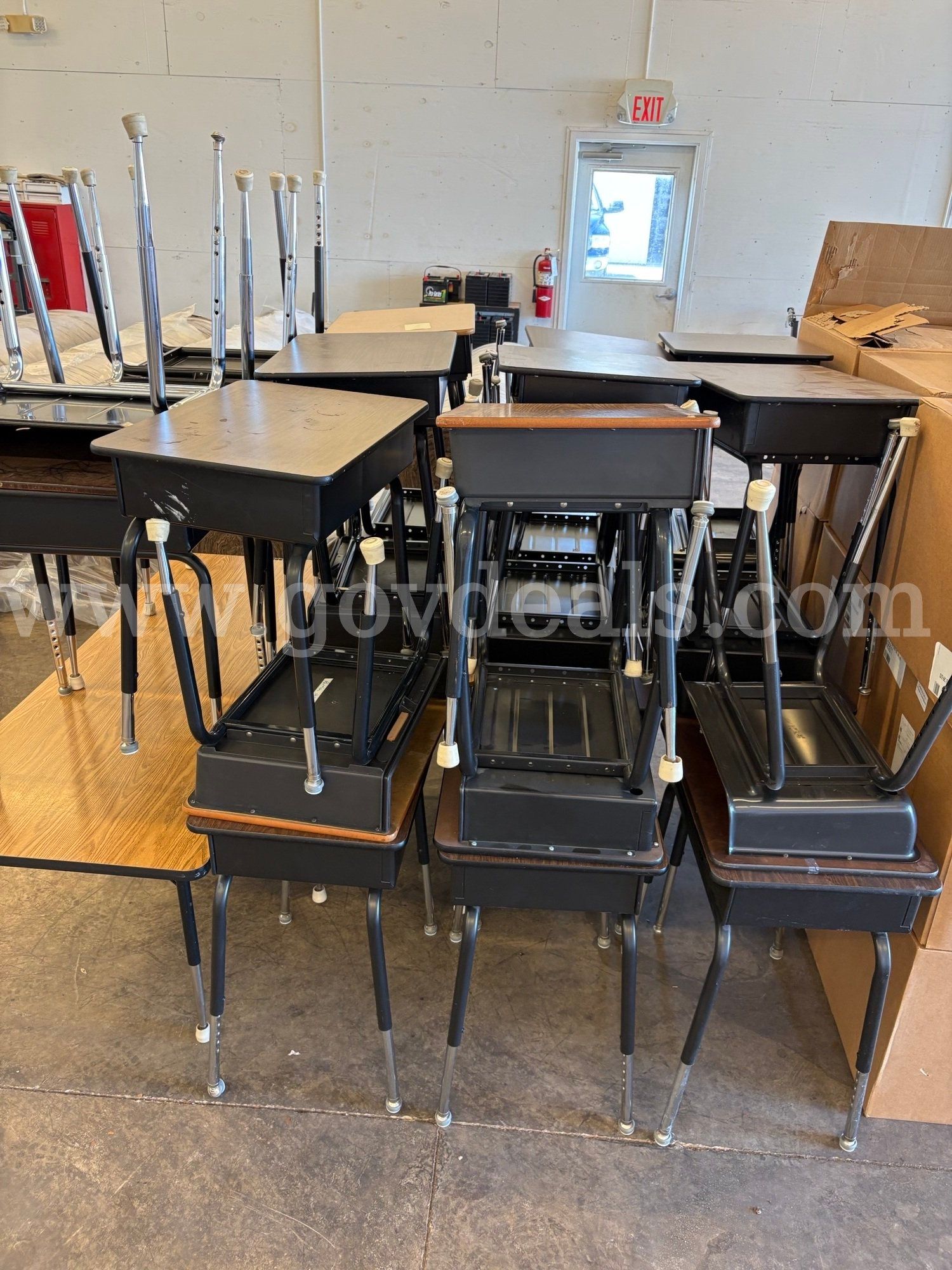 Lot of (32) Assorted Desks and (1) Table
