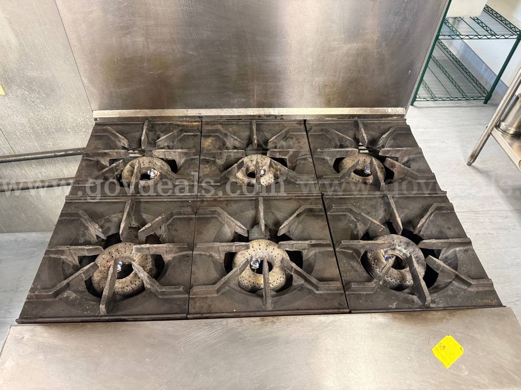 Commercial American Range six-burner gas range with standard oven,