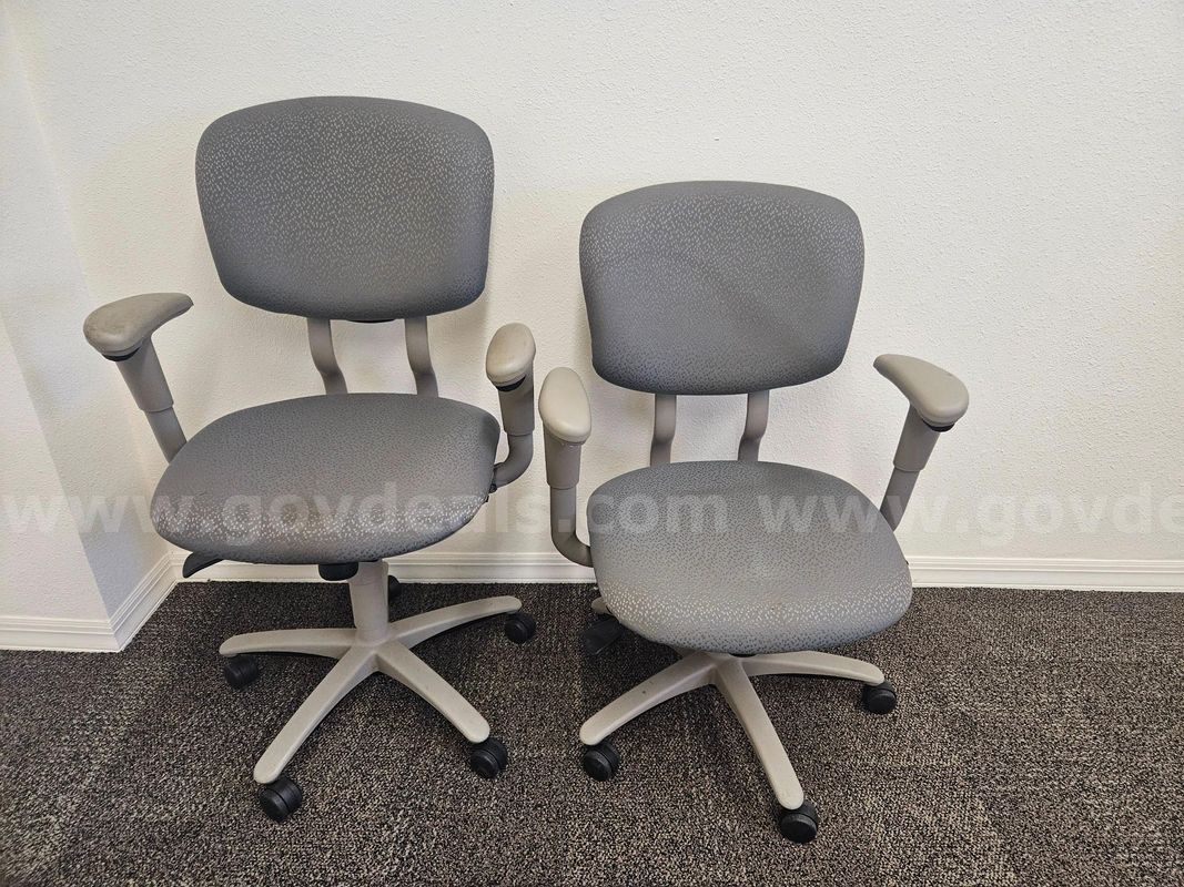 Two gray rolling desk chairs (25.5"x36-41"x19" each)
