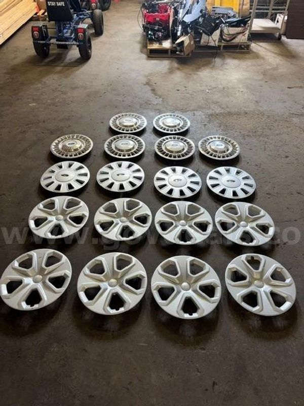 Eight (8) Ford Explorer Hubcaps and Ten (10) Crown Victoria Hubcaps
