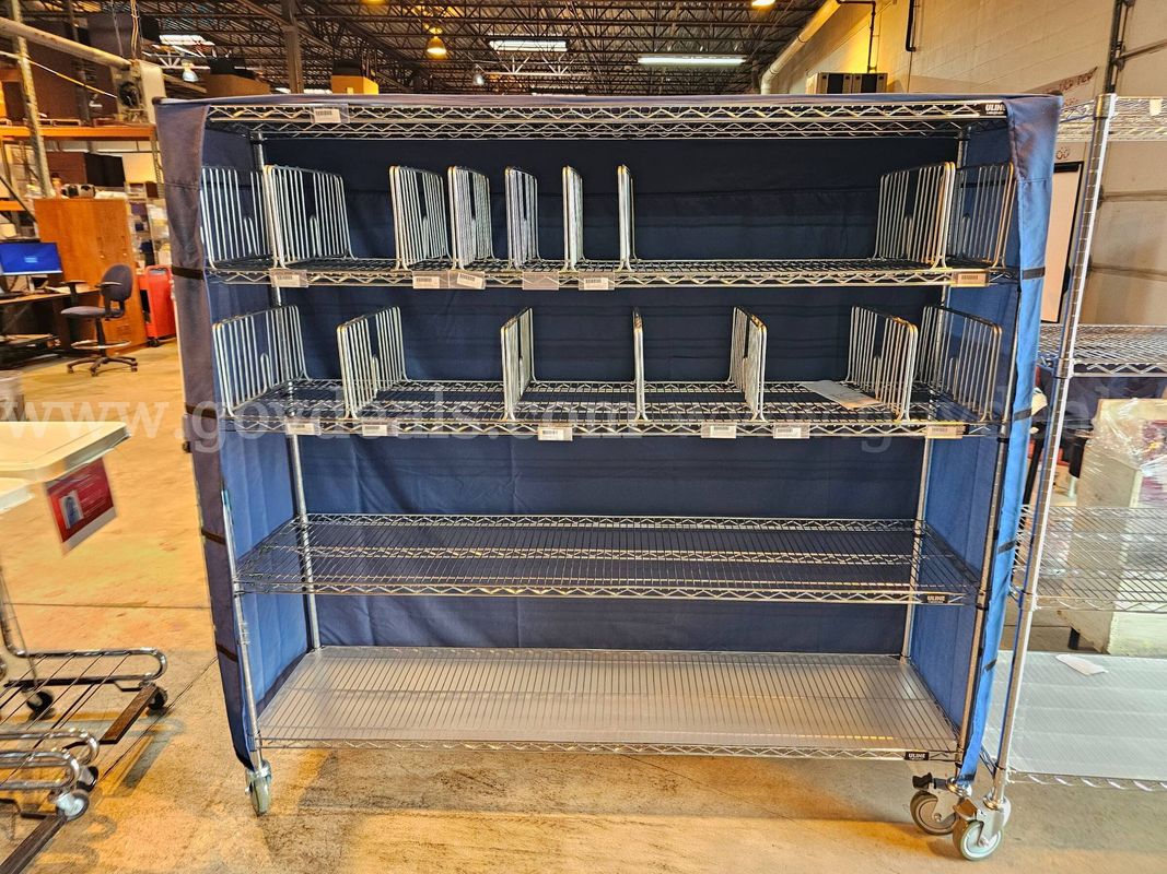 Lot of 2- Metal racks on wheels.  One w/Blue Uline Cover 61.5" H  X  71" W