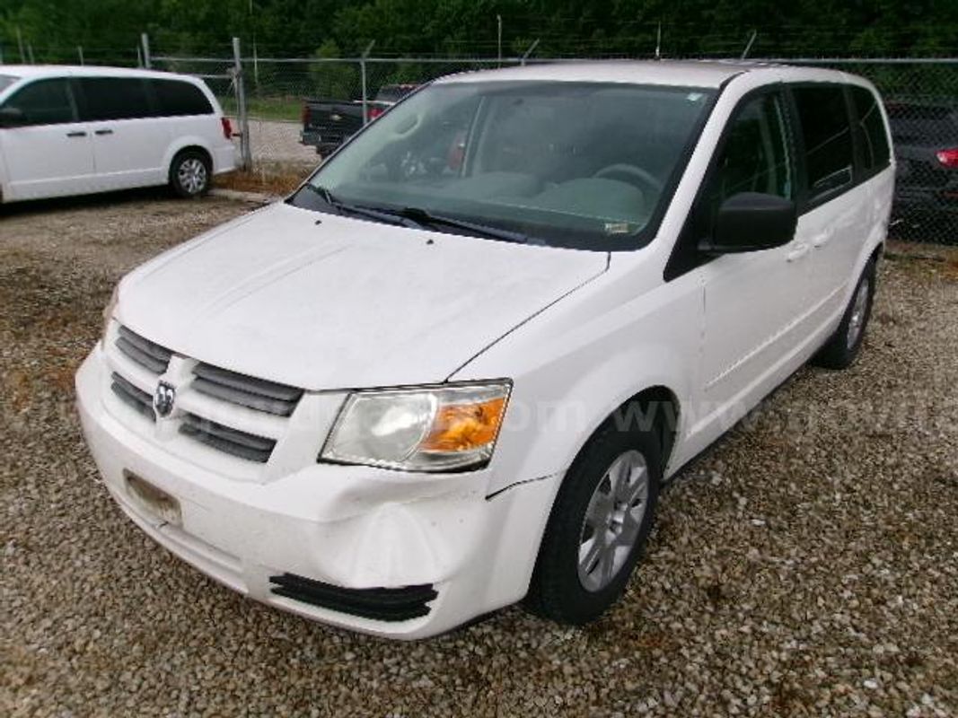 2009 Dodge Grand Caravan; (75,640 Miles).