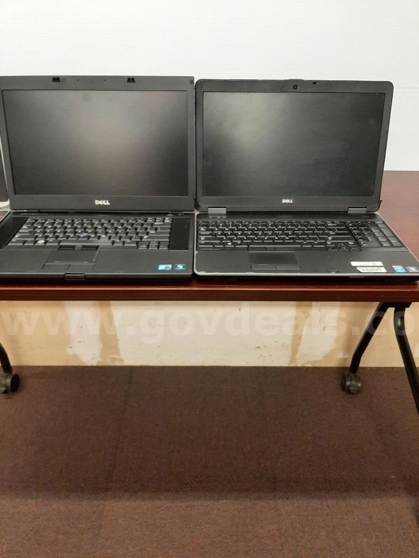 (12) Dell Laptops