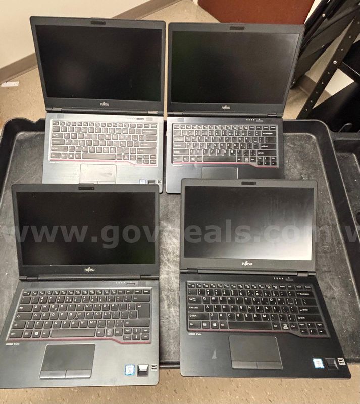 4 Laptops and 4 Docking Stations