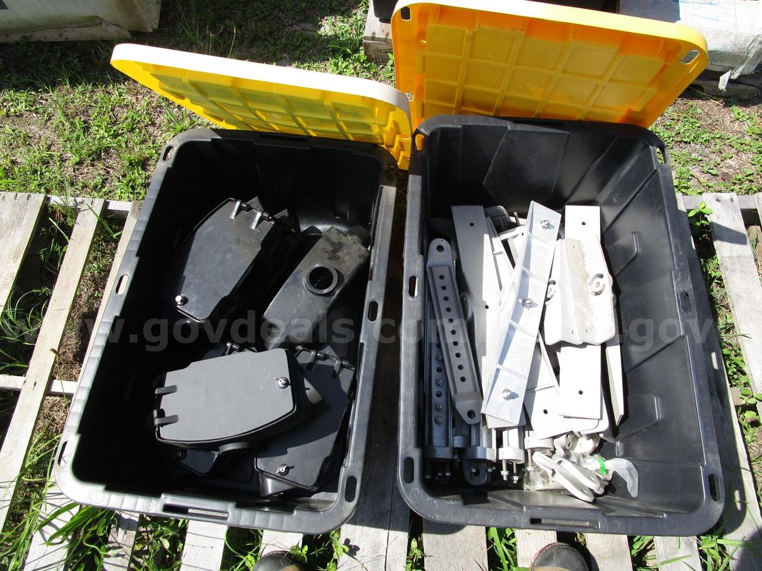 (1) Unused Plastic Bin Of Hanger Junction Boxes; (1) Unused Plastic Bin Of Metal Arm Brackets