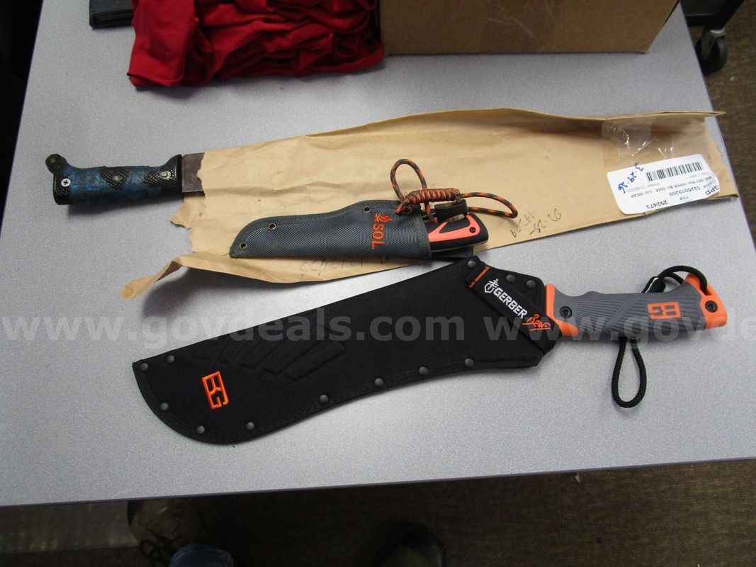 (2) Used Machettes And (1) Used Knife