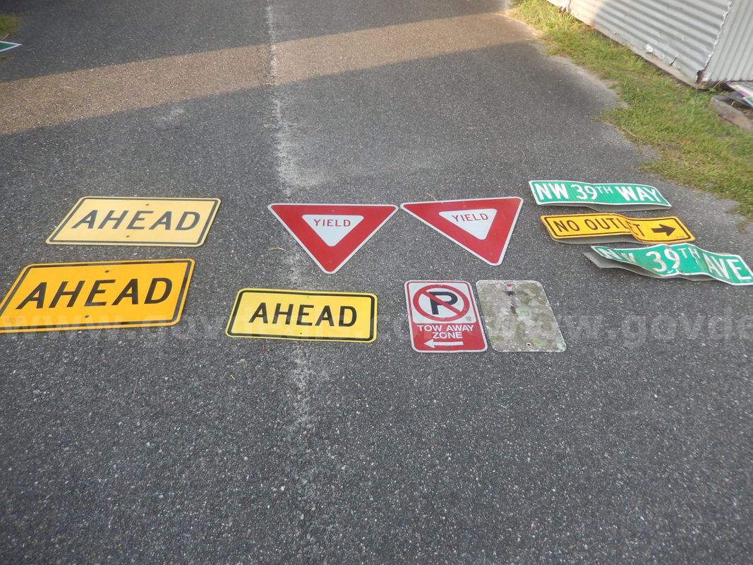 Used (2) Yield Signs, (3) Ahead Signs, (2) Street Signs, (1) No Outlet Sign, (2) Tow Away Zone Signs