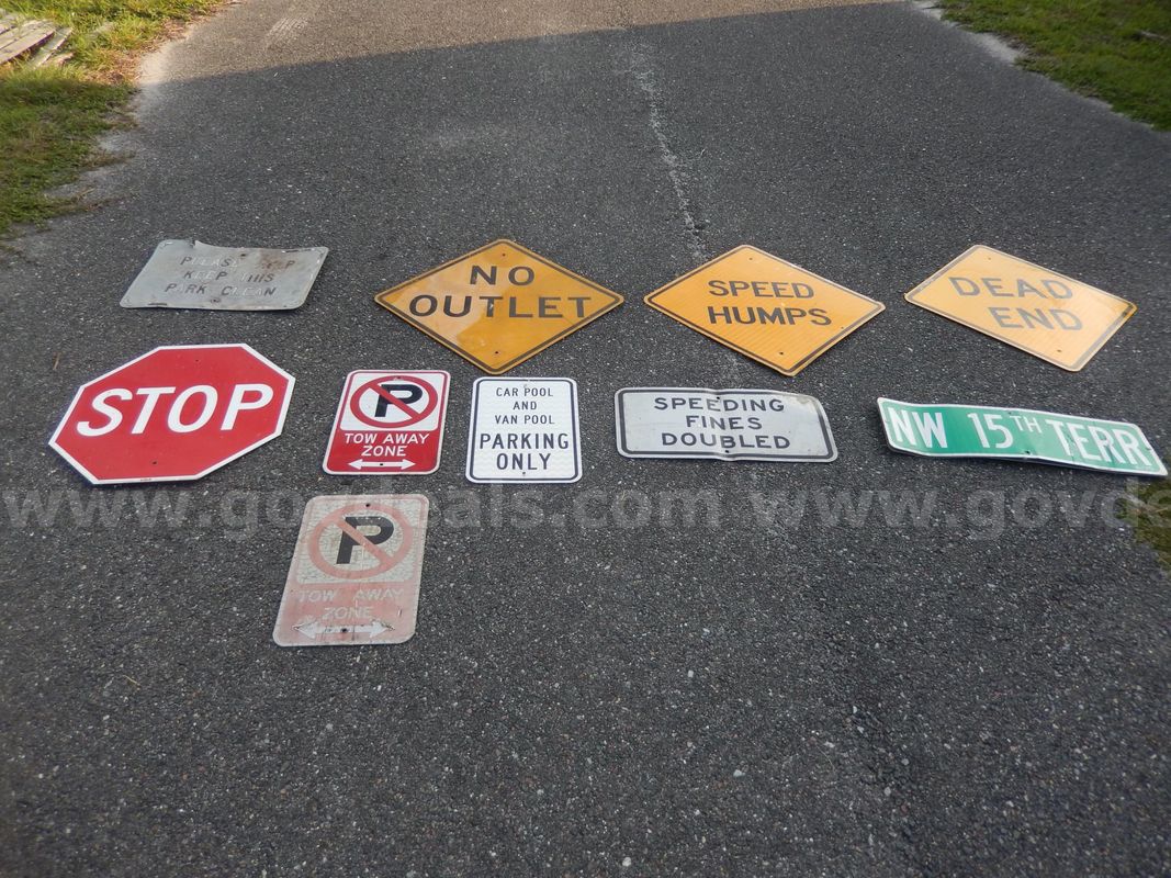 Used (2) Tow Away Zone Signs, (1) Stop Sign, (1) No Outlet Sign, (1) Speed Humps Sign, (1) Dead End Sign