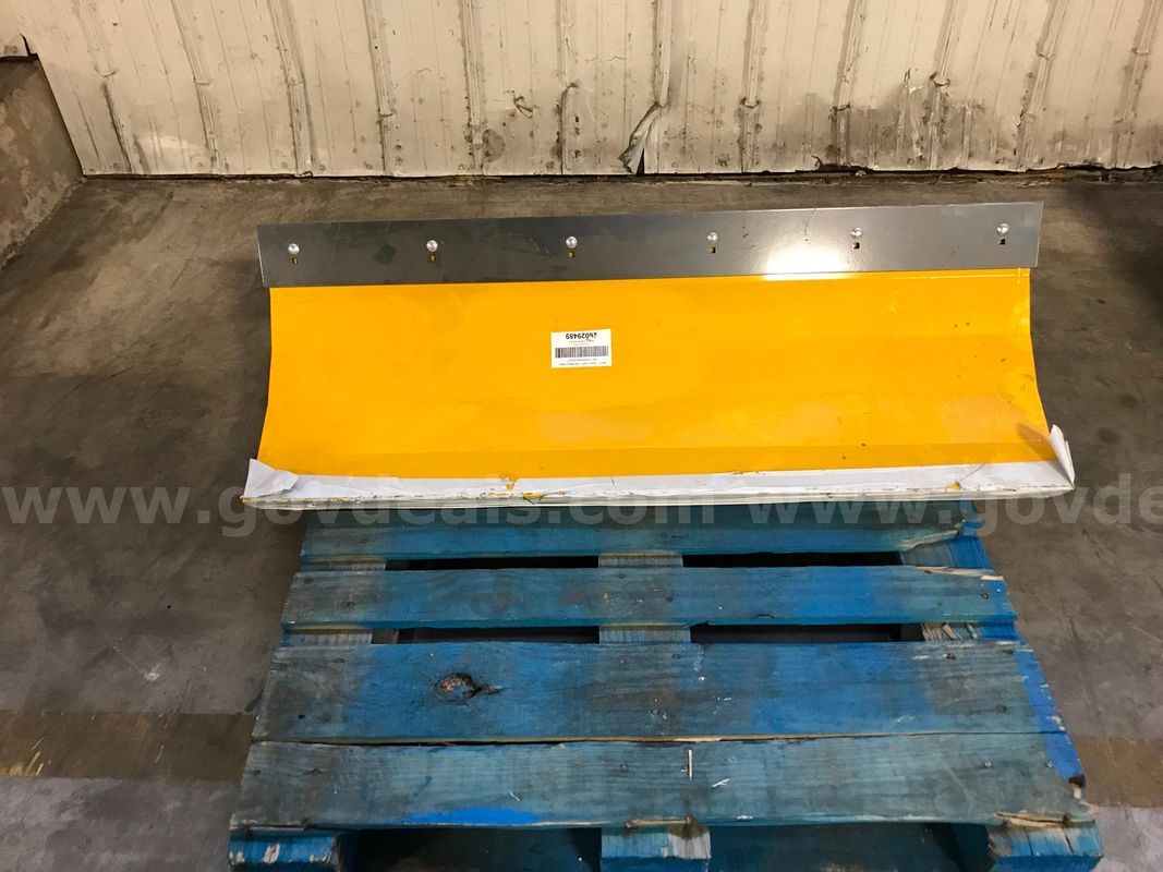 Walker Snow Blade And Accessories On A Pallet.