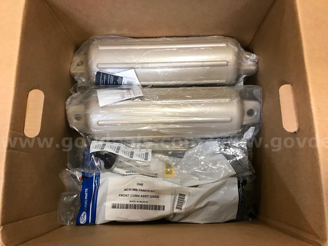 Box of Inflatable Vinyl Fenders + Miscellaneous Ford Parts