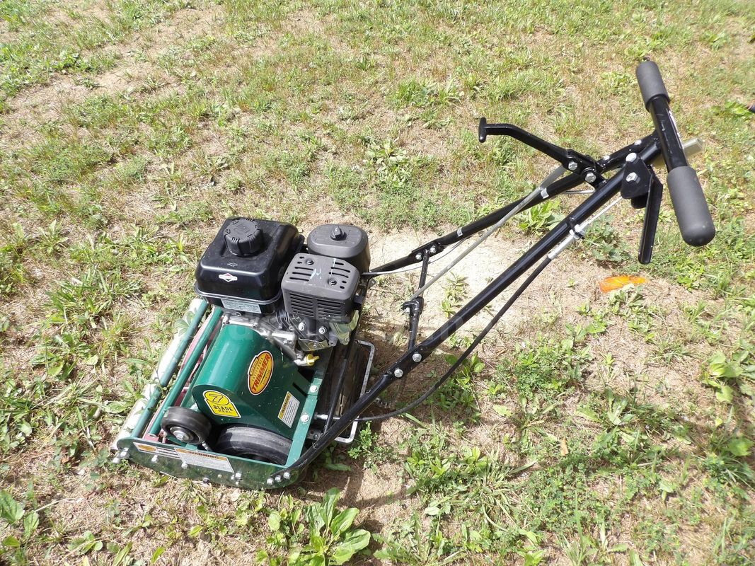 Walk-behind self-propelled reel lawn mower