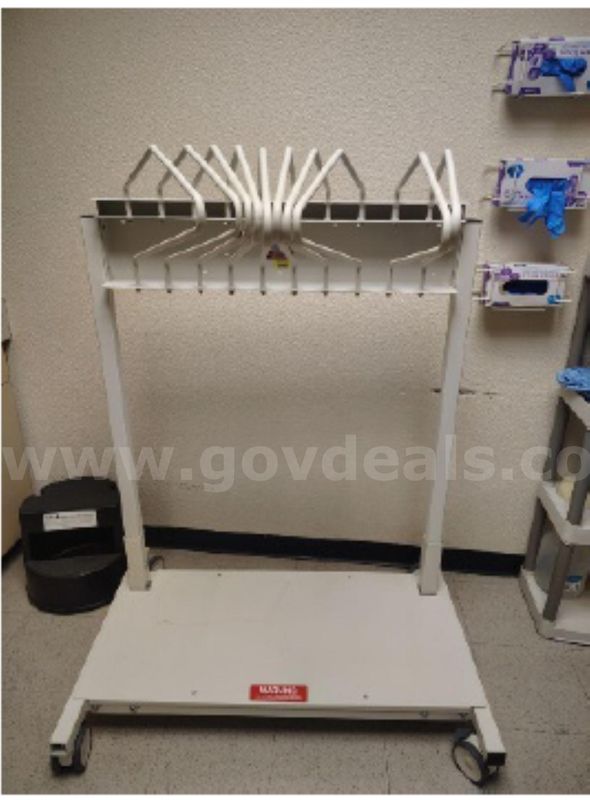 Protective apron hanger