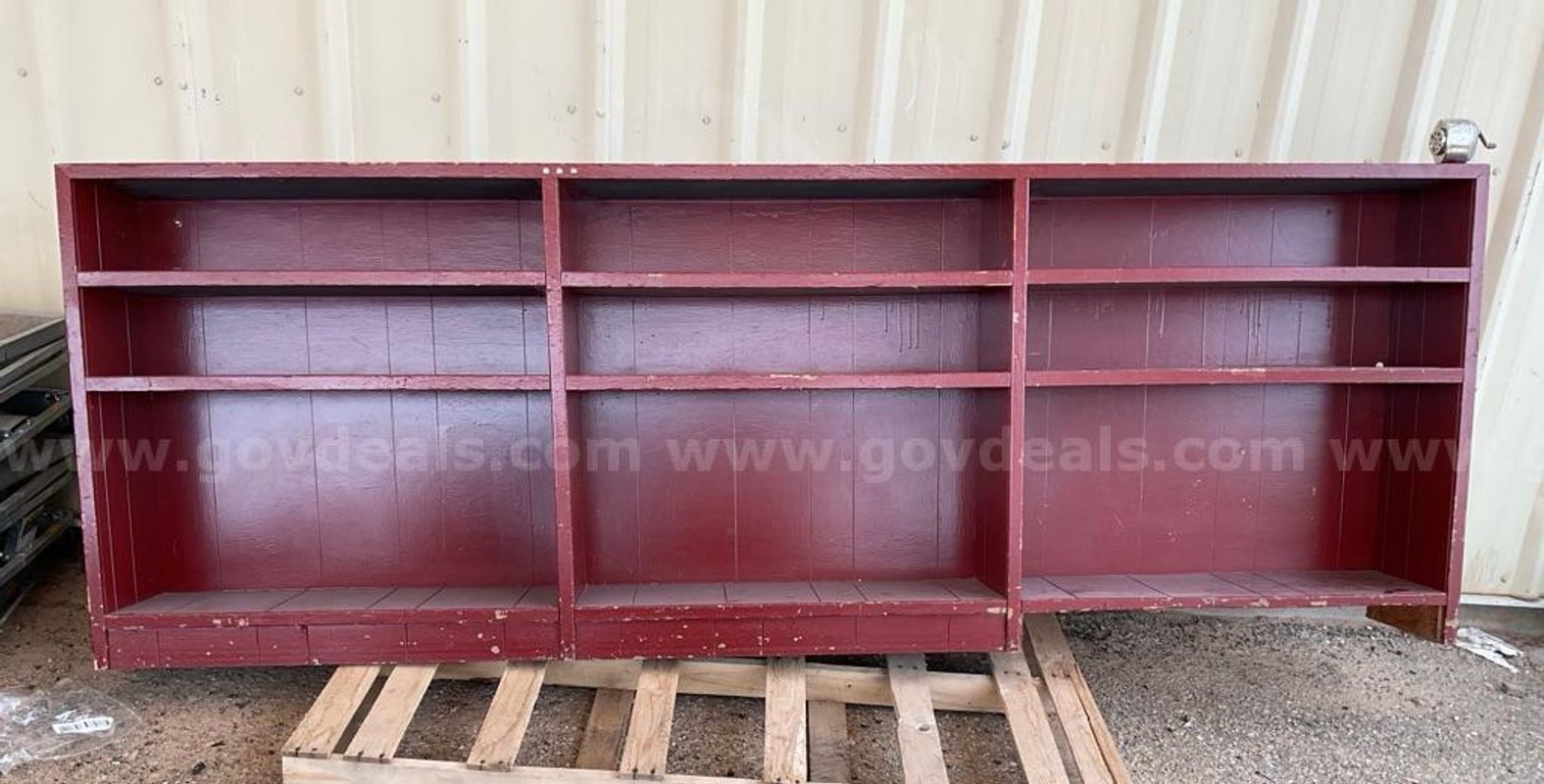 Wooden bookcase with compartments